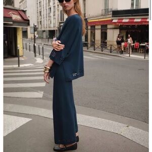 KNIT PANTS WITH OPENWORK EMBROIDERY . Size M